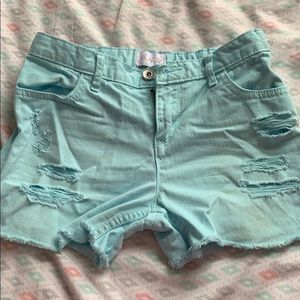Light blue Jean shorts with rips